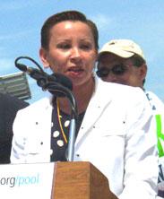 Congresswoman Nydia M. Velázquez behind a podium